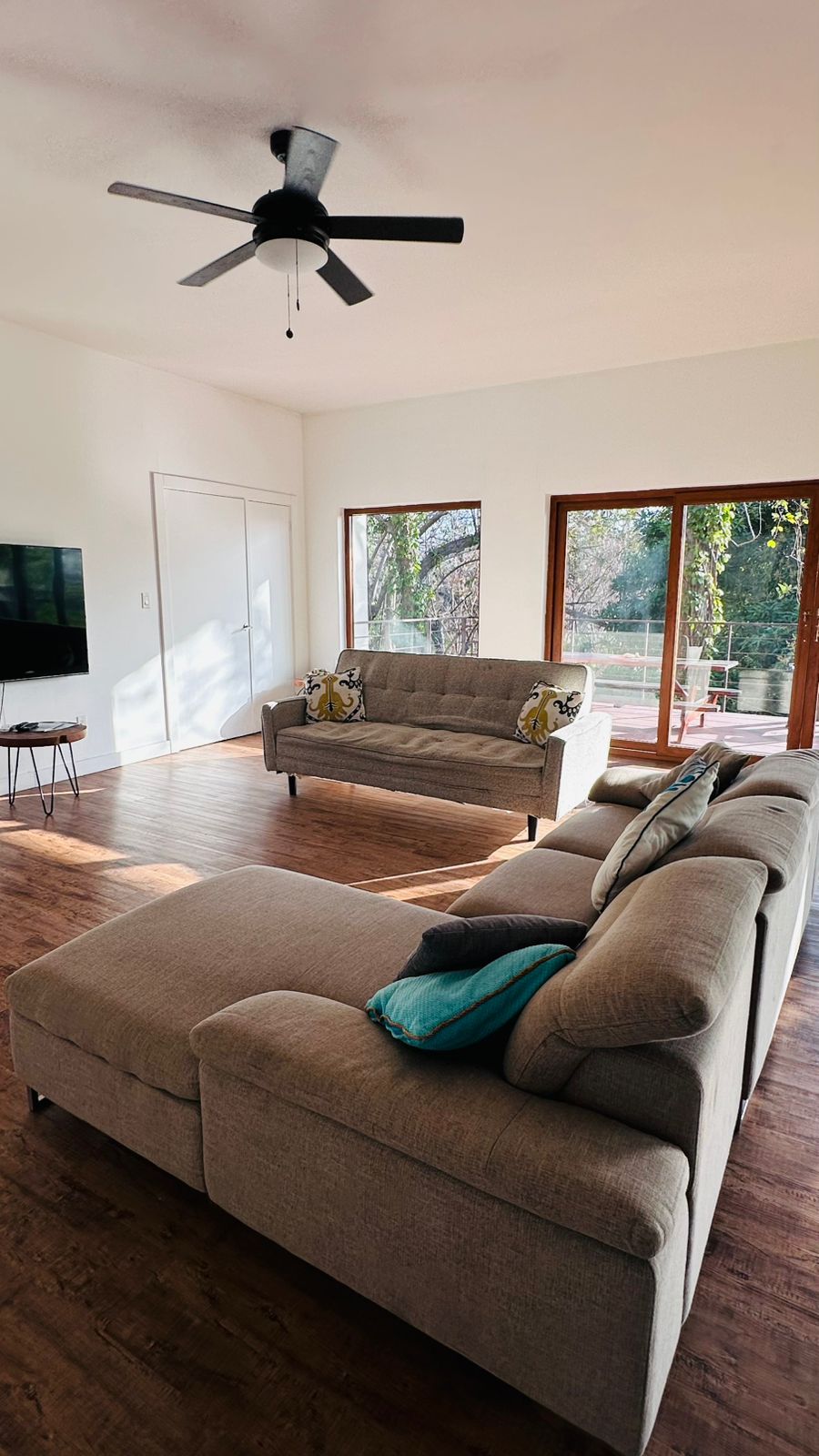 Light-filled living room with panoramic windows in Gemini II